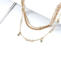 Orvik Boho Layered Necklace — Crystal Stars in Vintage Gold for the Free Spirit