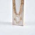 Orvik Boho Layered Necklace — Crystal Stars in Vintage Gold for the Free Spirit